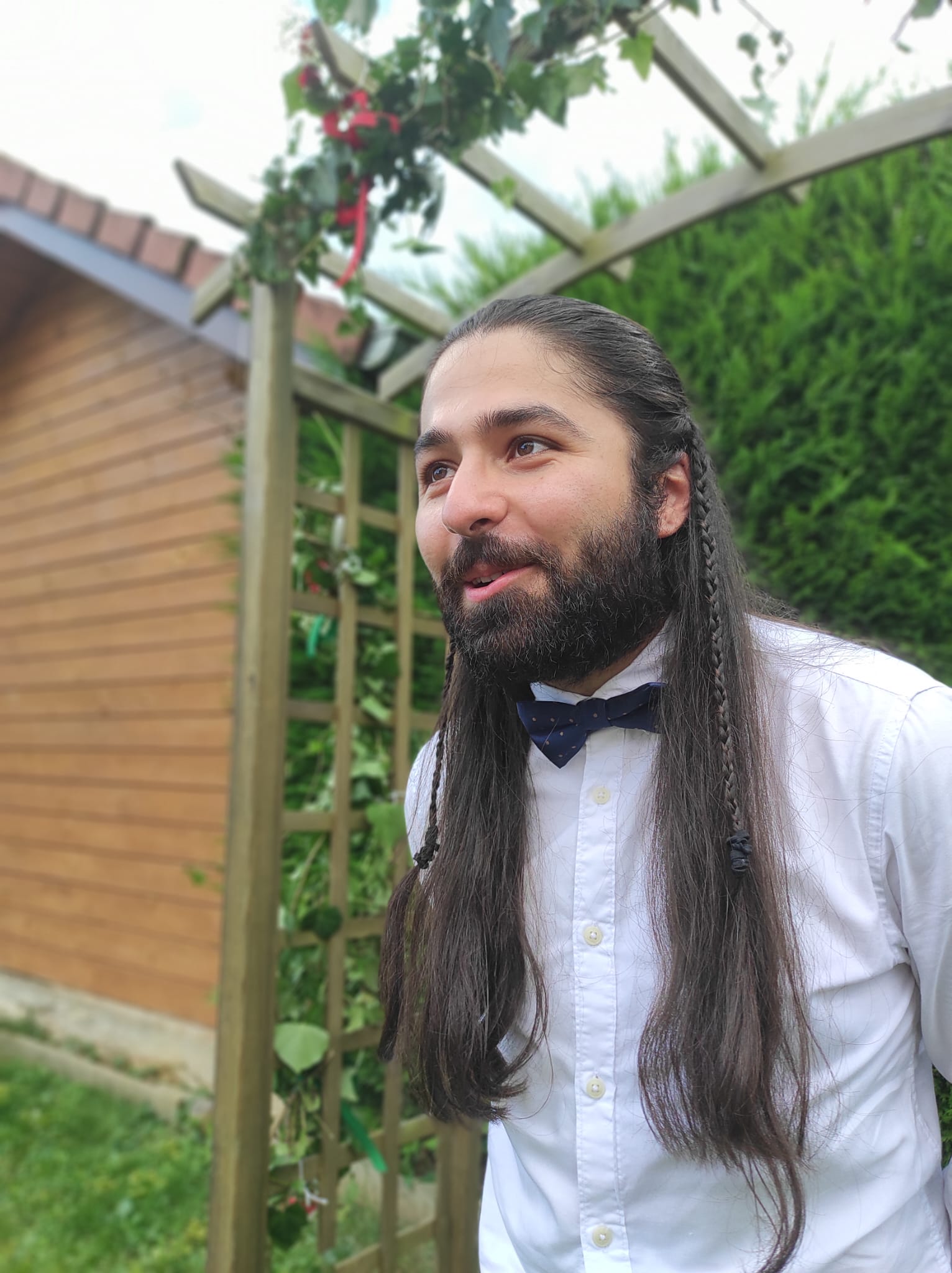 Large deviations of the random metric in first-passage percolation